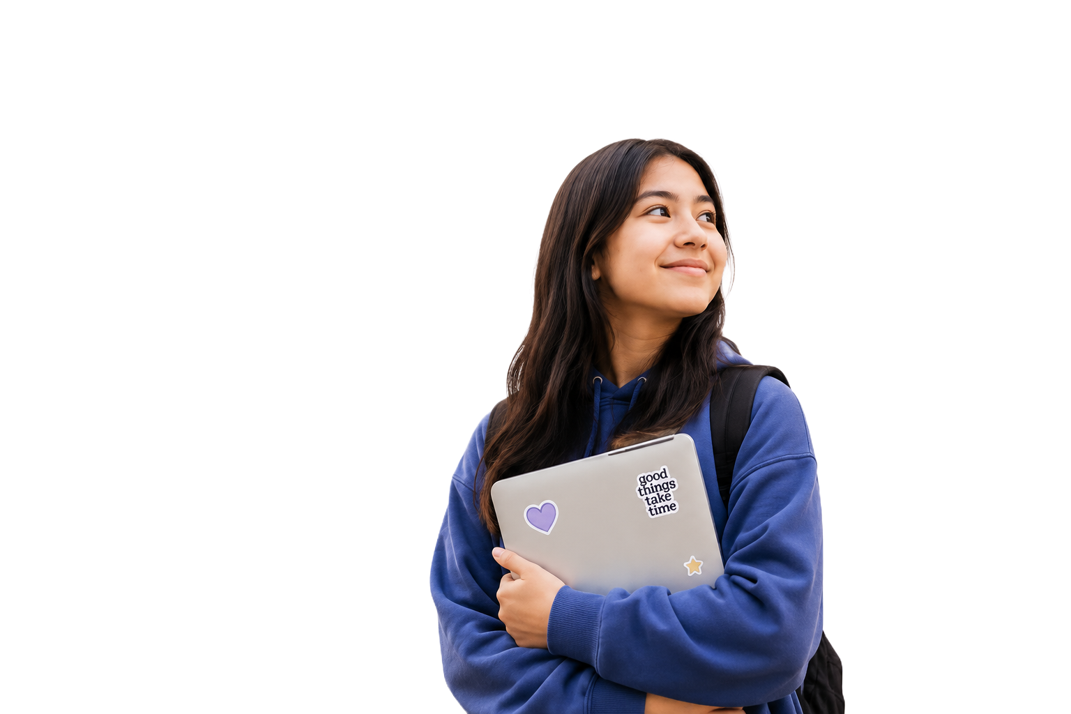 A smiling high-school student holding a laptop, looking ahead
